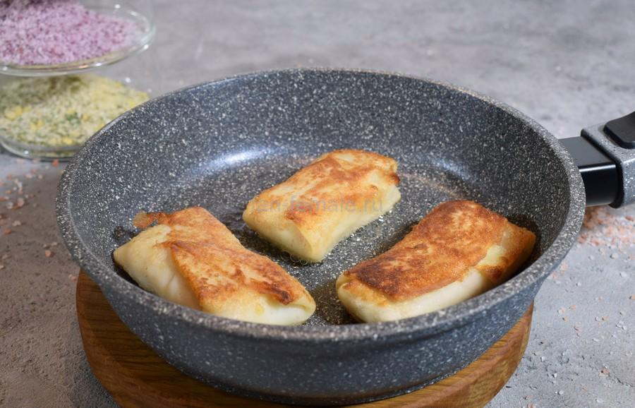 Приготовление блинов, начиненных фаршем из отварной свинины с рисом, шаг 9